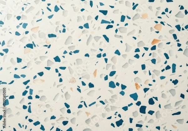 Fototapeta Close-up of terrazzo flooring featuring blue, gold, and white chips, creating a stylish and modern surface