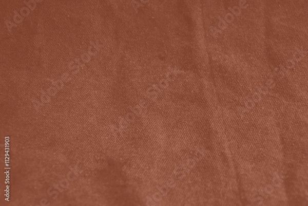 Fototapeta Mocha Mousse colour monochrome texture knitted fabric. Brown knitted Jersey as textile background. Monochrome color background. Wool knitting texture. Trendy color 2025.