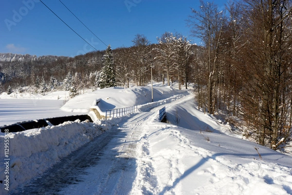 Obraz Mountain road covered with snow