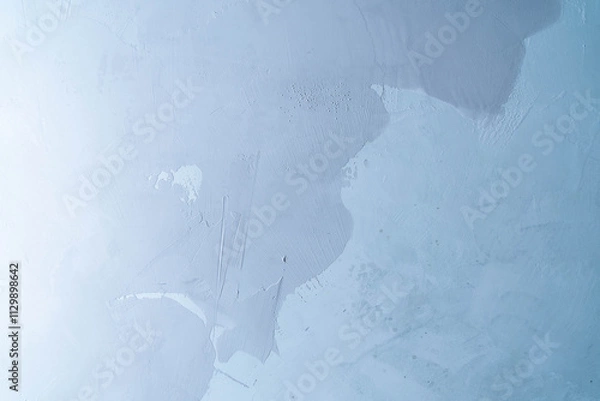 Obraz The texture of a concrete wall with applied decorative plaster or microcement. Part of the micro-cement has been applied and is still wet. A template for your product or text