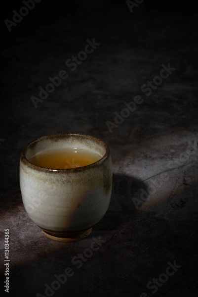 Fototapeta Minimalist Tea Cup on Rustic Surface