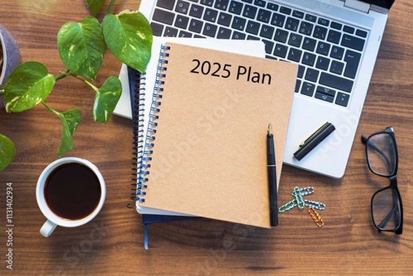 Fototapeta Note book with 2025 goals text on it to apply new year resolutions and plan.