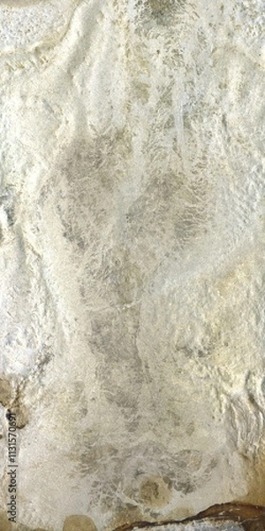 Fototapeta Close up of natural stone texture background. High resolution photo. Full frame. Abstract background and texture for design. Fossilized rock. Molten silver ingot, white metal.