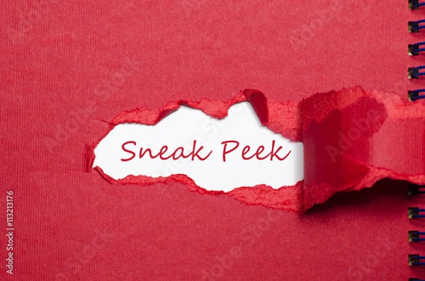 Fototapeta The word sneak peek appearing behind torn paper.