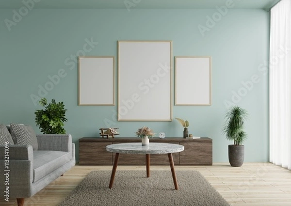 Obraz Living room with picture frame There is a sofa on the floor decorated with beautiful plants.