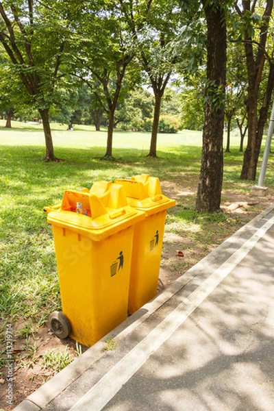 Fototapeta Yellow plastic bin