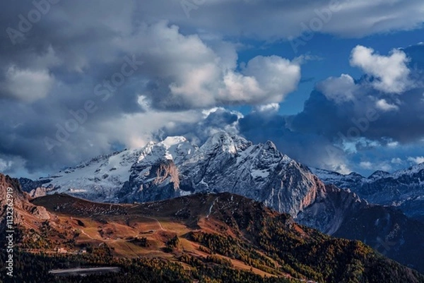 Fototapeta Panoramic view of snow-capped mountains in the Dolomites in Italy.