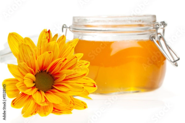 Fototapeta Flower and honey jar