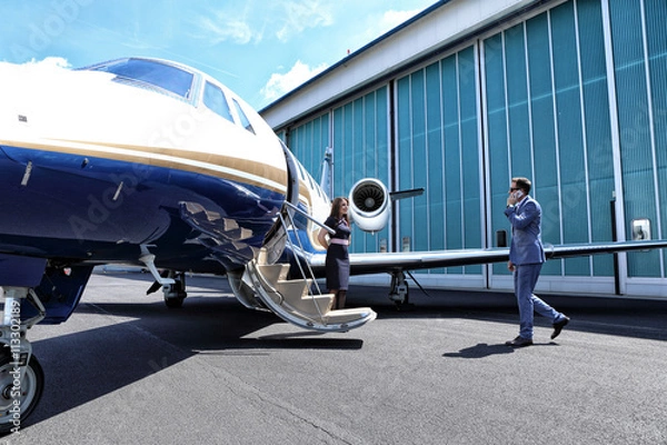 Obraz Young man arriving to the plane