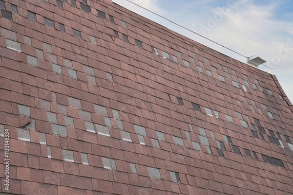 Fototapeta Missing Shingles on Mansard Roof - Long View with Clouds