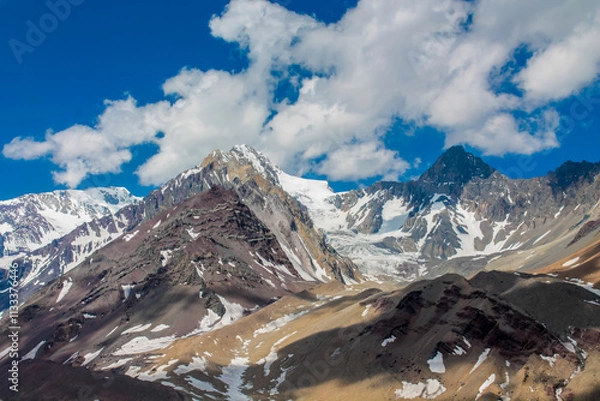 Fototapeta San Jose Volcano mountain in the Andes, Chile. Chilean Andes peak with snow, ice and glacier near to Santiago de Chile, Cajon del Maipo. Volcanic mountain slopes and summit in the Andes