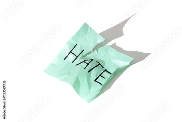 Obraz Word "hate" on crumpled paper