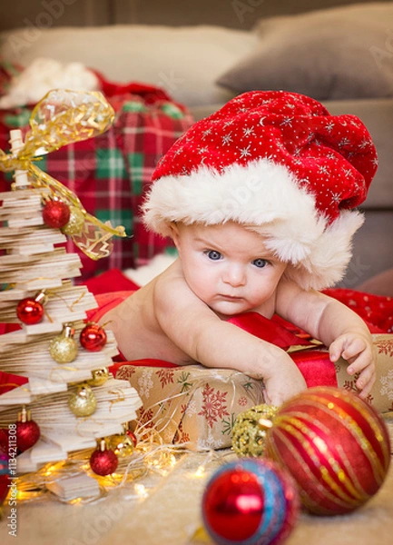 Obraz little child with christmas decorations