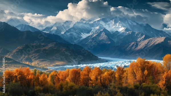 Fototapeta Autumn Majesty: Vibrant Orange Trees Against Majestic Snow-Capped Mountains and Glacier