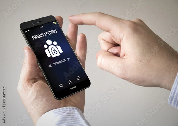 Fototapeta  touchscreen smartphone with privacy settings on the screen