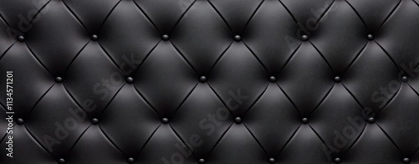 Obraz A black leather couch with a black and white pattern