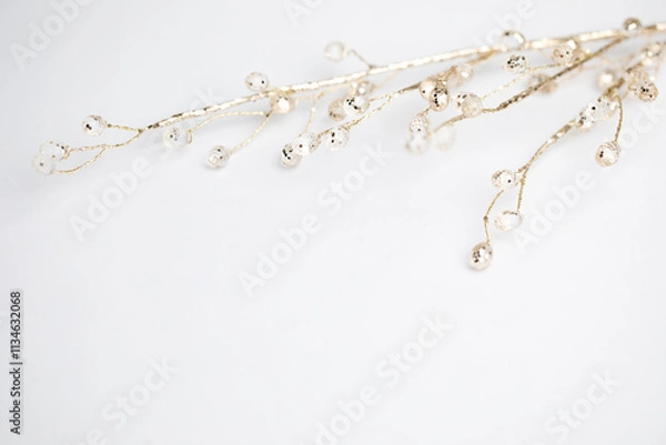 Obraz Gold twig decoration with balls on white background