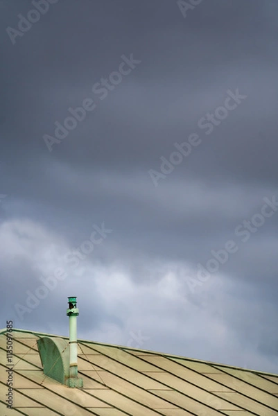 Fototapeta clouds over a green roof