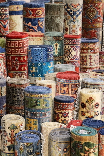 Fototapeta Carpets rolled in a carpet store