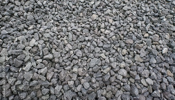 Fototapeta A pile of gray gravel.  A textured background.