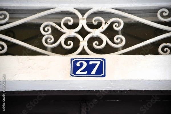 Obraz The number 27 above door