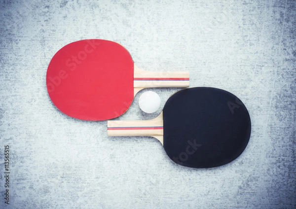 Obraz Ping pong or table tennis paddles and ball. Sport equipment with tabletennis rackets for leisure activity. Concept of game, recreation and playing ping-pong.