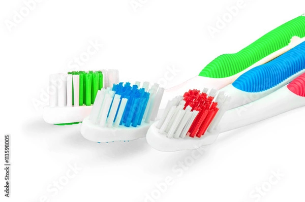 Obraz Три зубных щетки крупным планом
