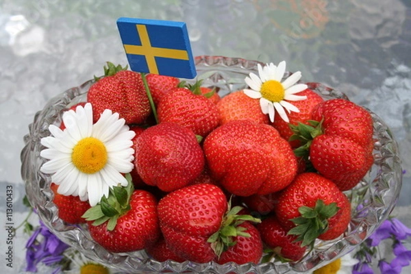 Fototapeta Swedish Midsummer dessert - strawberries - with Swedish flag on top