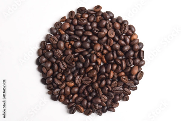 Fototapeta Top view of Coffee beans in circle shape isolated on white background.