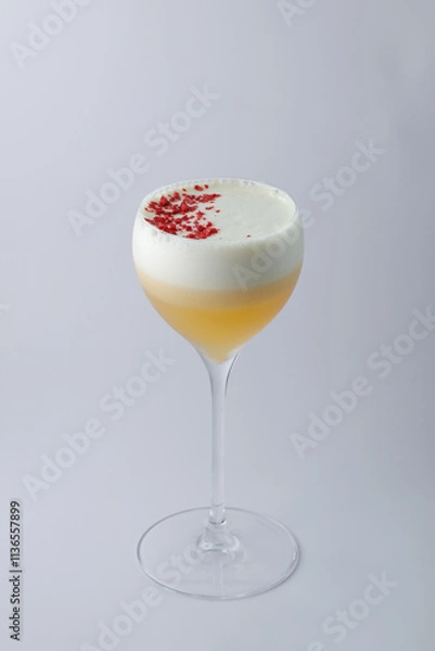 Obraz A delightful drink served in a wine glass adorned with foam on top