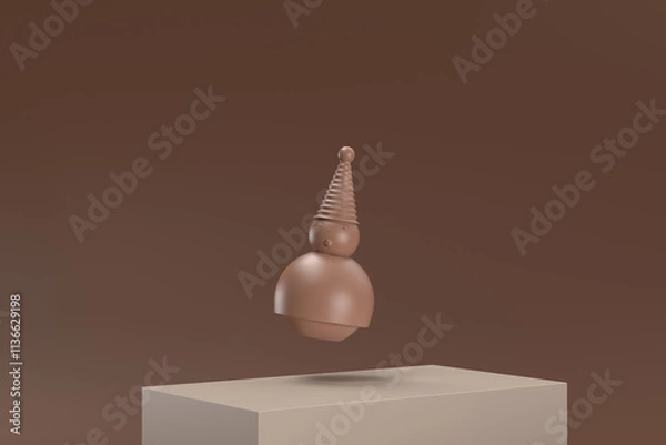 Fototapeta A small brown figure with a hat is floating in the air