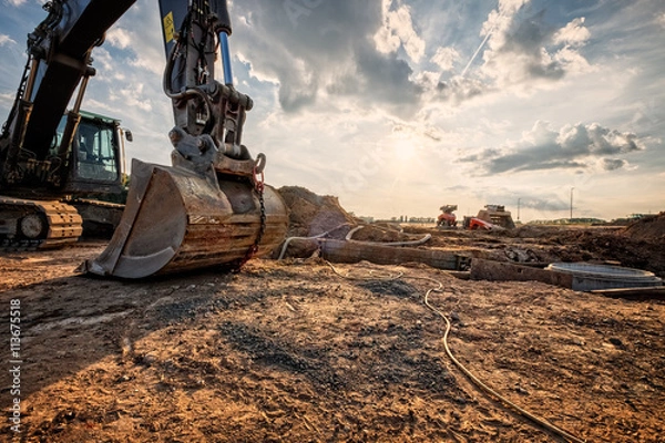 Fototapeta Schaufelbagger mit baustelle
