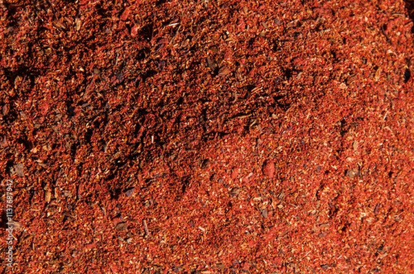 Obraz Red, yellow and orange spices in a pile in a farmers market