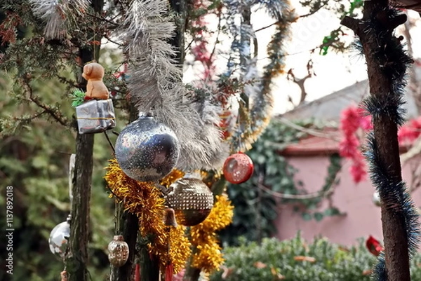 Obraz Happy New Year.Christmas tree decorations and toys for fir trees covered with snow and ice. Close-up. Merry Christmas.2024.