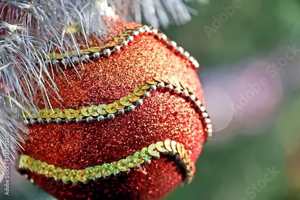 Obraz Happy New Year.Christmas tree decorations and toys for fir trees covered with snow and ice. Close-up. Merry Christmas.2024.