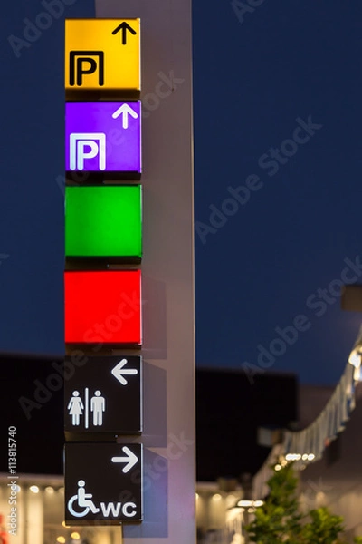 Obraz directional signs on a pole shopping center
