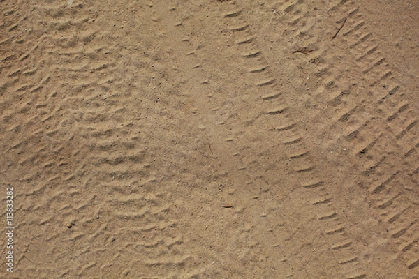 Fototapeta  texture tread marks in the sand