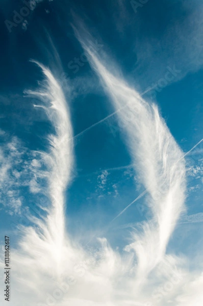 Obraz Ethereal cloud patterns are beautifully displayed against a captivating blue sky backdrop