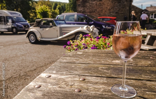 Obraz glass of wine over background with retro cars, traveling in the UK, holiday concept