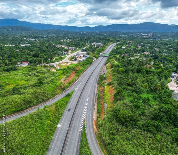Obraz North South tool road highway from St Catherine Kingston to Mammee Bay St Ann Ocho Rios Montego Bay North Coast Jamaica with bridge