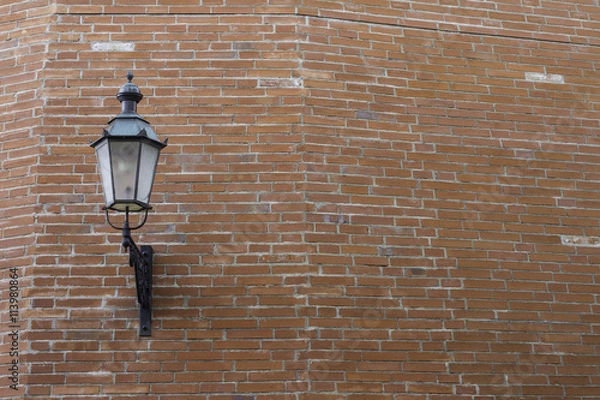 Obraz Lamp on a Brick wall