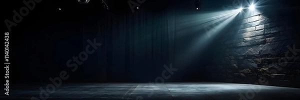 Obraz Spotlight casting a beam of focused light on a bare stage wall, serving as a PowerPoint background, complemented by a subtle gradient from navy blue to black, giving depth