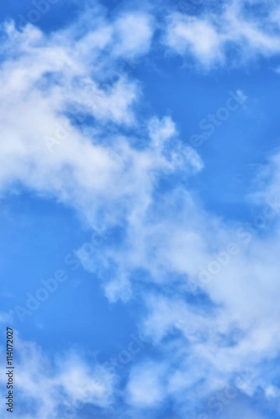 Fototapeta Puffy clouds on blue sky background