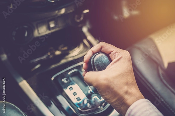 Obraz Hand shifting gear