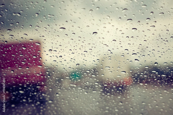 Fototapeta Rain drop on car window. retro filter