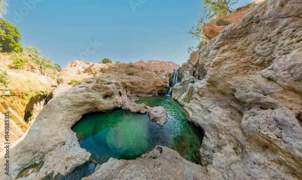 Fototapeta Extreme wide angle photo of Wadi Tiwi pool  oasis in Oman.