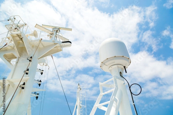Fototapeta Sattelite communication antenna and radar mast of ship.
