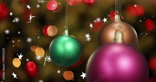 Fototapeta Image of shiny christmas baubles with white stars and flashing yellow lights