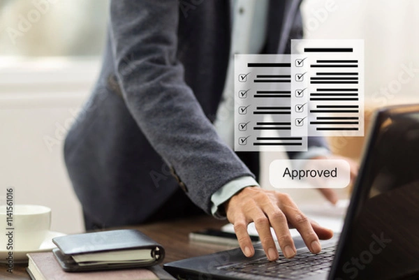 Fototapeta businessman work with laptop and  review document checklist with approved at workplace in office, process document management system concept