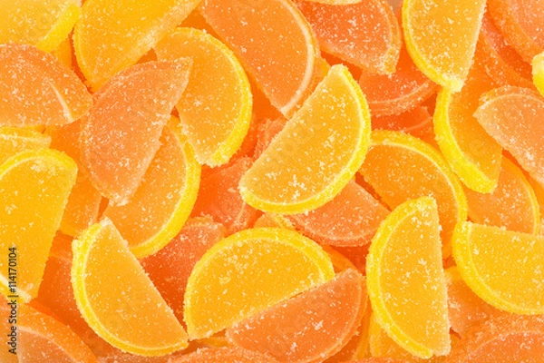 Obraz Orange and lemon candy slices as background